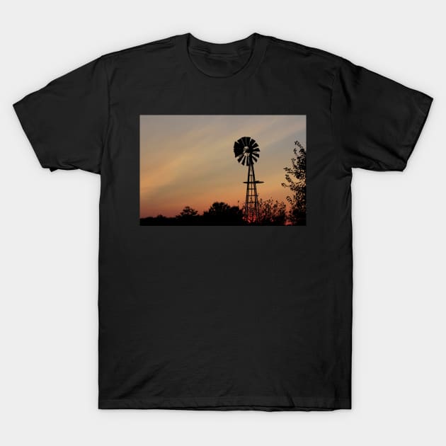 Windmill silhouette with a colorful Sunset Smokey sky T-Shirt by ROBERTDBROZEK